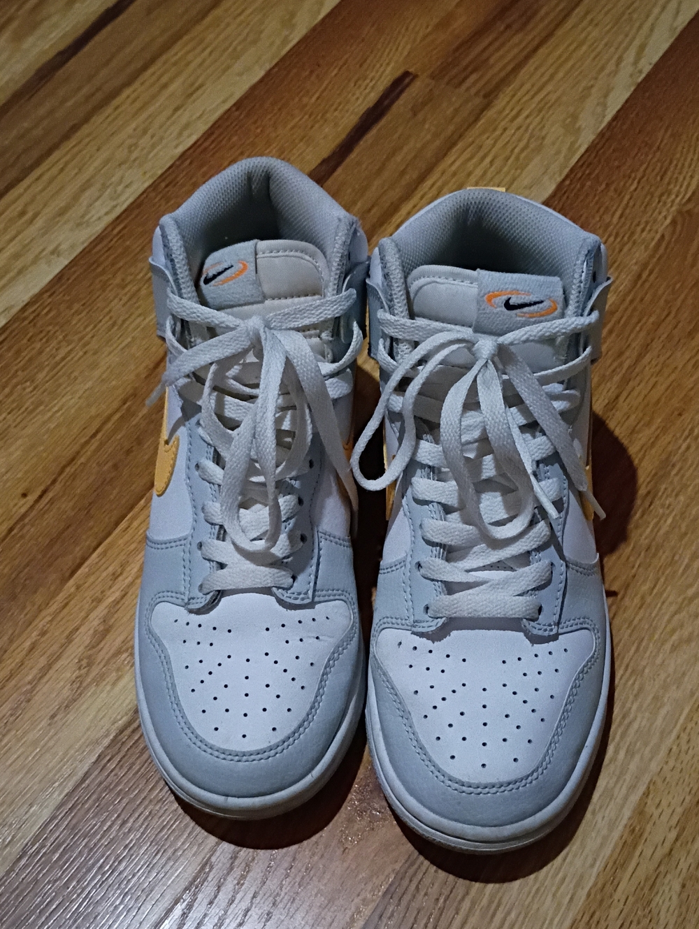 Nike Kids High-Top Sneakers in Light Gray with Orange Swoosh